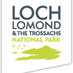 Logo of Loch Lomond and The Trossachs National Park featuring flying birds and hills in green design
